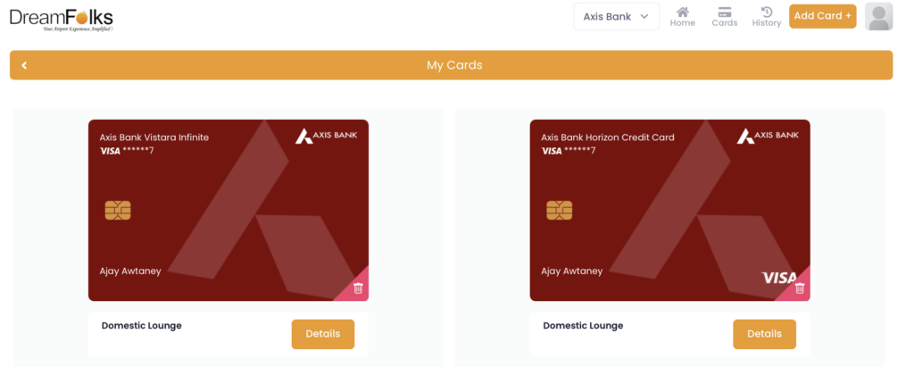 The image shows a webpage from DreamFolks displaying two Axis Bank credit cards. The left card is an "Axis Bank Vistara Infinite" Visa card, and the right card is an "Axis Bank Horizon Credit Card" Visa card. Both cards have a red design with the Axis Bank logo and a chip. The name "Ajay Awtaney" is on both cards. Below each card, there is a button labeled "Details" and the text "Domestic Lounge." The webpage has a navigation bar with options like "Home," "Cards," "History," and an "Add Card" button.